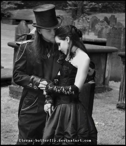 A Gothic couple kissing